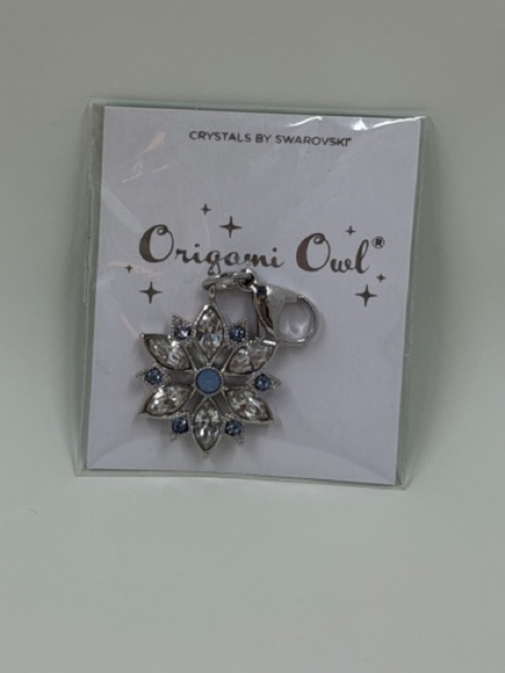 NEW in package Origami Owl Silver Tone Snowflake with Light Blue Crystal Accents